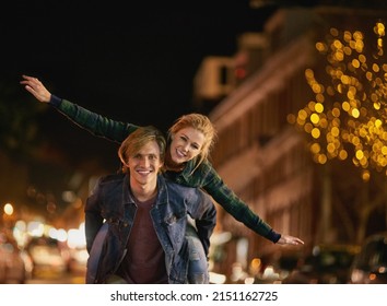 Having a blast of a time. Shot of a young couple out on a date in the city.