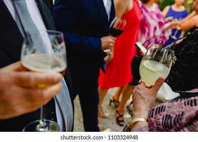 Having a drink at a wedding
