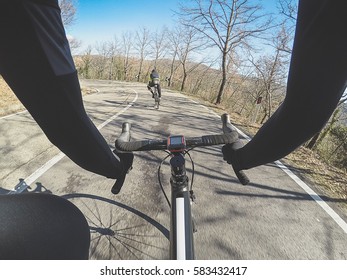 Having Fun On Racing Bicycle In Tuscany. POV
Personal Perspective Shot Of A Cyclist During A Workout On Winter Season On The Beautiful Tuscan Countryside