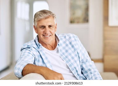 Having a relaxing day at home. Cropped shot of a mature man relaxing on his sofa at home. - Shutterstock ID 2129308613