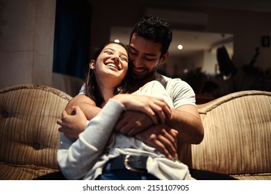 Having Your Arms Around Me Makes Me Feel Safe. Shot Of An Affectionate Couple Spending Quality Time Together At Home.