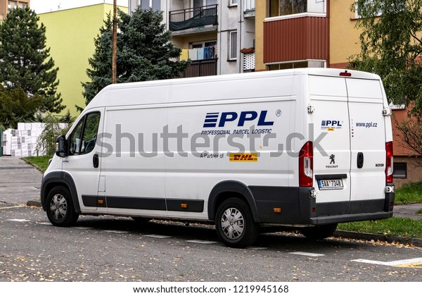 HAVIROV, CZECH REPUBLIC - OCTOBER 23, 2018: White\
delivery van of PPL company, partner of global DHL postal service,\
parked when delivering parcels. The image was taken on October 23,\
2018.
