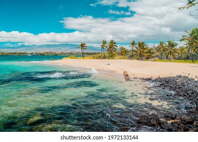 Hawaii beach travel landscape. Summer vacation hero view of woman tourist walking on secluded bay in Waikoloa, Big Island, HAWAII, USA destination.