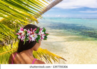 Hawaii Beach Woman Luau Dancer Relaxing Wearing Wreath Of Fresh Flowers On Tahiti Bora Bora, French Polynesia.