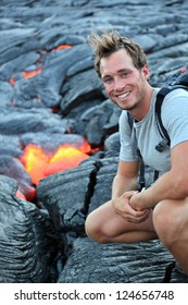 Hawaii: Hiker Seeing Lava From Kilauea Volcano Around Hawaii Volcanoes National Park, USA. Young Caucasian Man Hiking.