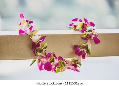 Hawaii Luau Icon Travel Concept: Fresh Lei Flowers Necklace, Kauai Hawaiian Island Tropical Vacation Background.