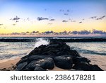 Hawaii sunrise from Ewa Beach with a crashing Wave