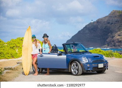 Hawaii surfers people lifestyle happy living friends talking on beach relaxing from surfing with surfboards. Friends laughing having fun in Oahu island, USA travel lifestyle. - Powered by Shutterstock