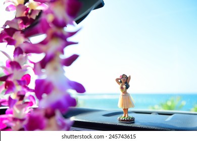 Hawaii Travel Car - Hula Girl Dancing On Dashboard And Lei During Road Trip.