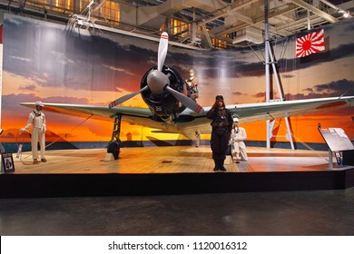 Hawaii, USA-March 16, 2017: Explanatory Figures Who Were In The Form Of Pilots, The Zero Battle Exhibited At The Pacific Aviation Museum Pearl Harbor In Hawaii Salute.