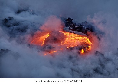 Hawaii. Volcano Eruption. Hot Lava Flows Into The Waters Of The Pacific Ocean.