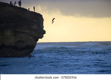 Hawaiian Cliff Jumping Into The Pacific Ocean