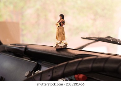 Hawaiian Hula Girl On Dashboard Of Car 