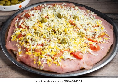 
Hawaiian Pizza With Egg Ham Tomato Cheeses And Olives