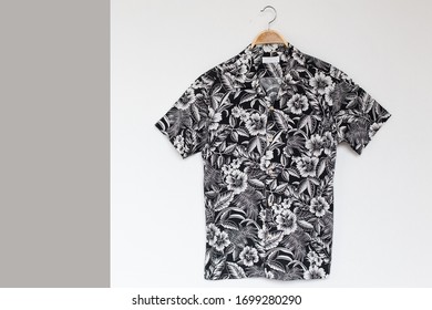  Hawaiian Shirt  Is Clothes Hanger On White Background.