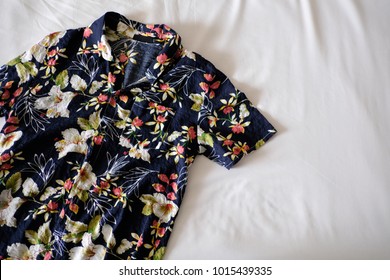 Hawaiian Shirt Is Placed On A White Mattress