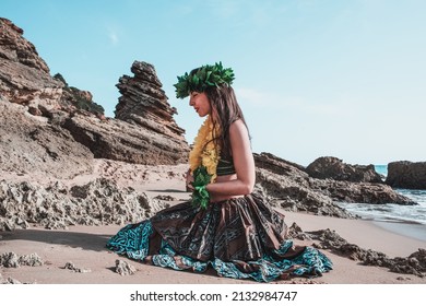 Hawaiian Woman Smiles Relaxed On A Paradise Beach. Exotic Beauty With Flower Crown On Her Head.