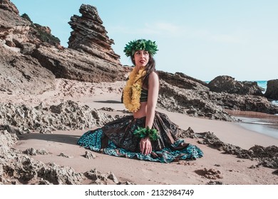 Hawaiian Woman Smiles Relaxed On A Paradise Beach. Exotic Beauty With Flower Crown On Her Head.