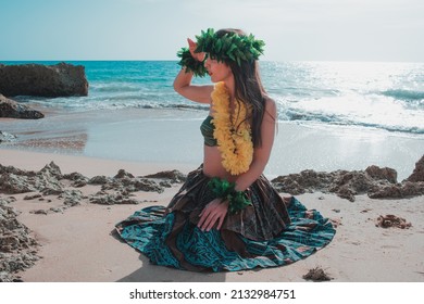 Hawaiian Woman Smiles Relaxed On A Paradise Beach. Exotic Beauty With Flower Crown On Her Head.