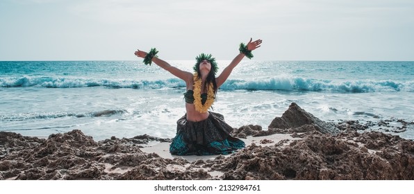 Hawaiian Woman Smiles Relaxed On A Paradise Beach. Exotic Beauty With Flower Crown On Her Head.