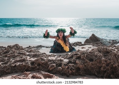 Hawaiian Woman Smiles Relaxed On A Paradise Beach. Exotic Beauty With Flower Crown On Her Head.