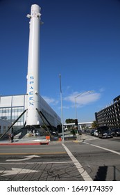 Hawthorne, California / USA - 2-17-2020: SPACEX HEADQUARTERS In Hawthorne California. The Only Private Company Capable Of Returning A Spacecraft From Low Earth Orbit. SPACEX Falcon 9 Booster.