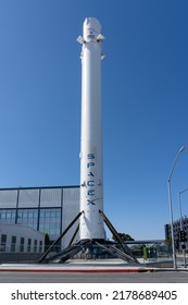 Hawthorne, California, USA - July 5, 2022: SpaceX Historic First Falcon 9 Rocket Booster That Returned Back On Earth Erected In Front Of SpaceX’s Headquarters In Hawthorne, California, USA. 