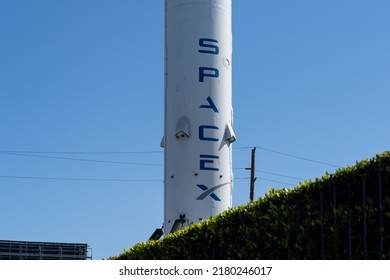 Hawthorne, California, USA - July 5, 2022: SpaceX Sign On The First Falcon 9 Rocket Booster That Returned Back On Earth Erected In Front Of SpaceX’s Headquarters In Hawthorne, California, USA. 