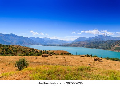 Hay Bales, Mountains, The Landscape Of Uzbekistan