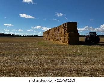 Hay Field And Bales In Canadian Prairies