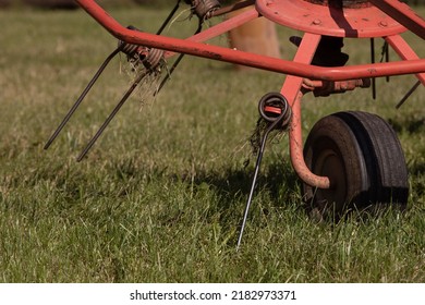 Hay Tedder Machine Closeup In Grass Agricultural Machine Farm