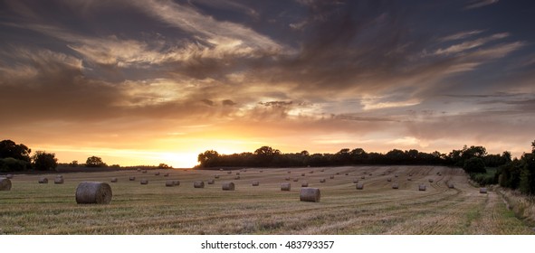 Hay-bale Sunset
The Sun Sets Dramatically Over A Farmer's Field In Langley, Warwickshire England