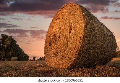 Haystack on farm field in morning. Haystack. Haystack farm field. Haystack view