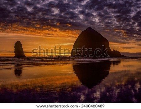 Haystack Rock at Cannon Beach Oregon at Sunset
