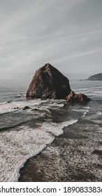Haystack rock from the drone on sunset. Cannon beach Oregon