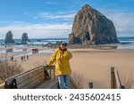 Haystack Rock and the Pacific ocean in Canon Beach Oregon coast.