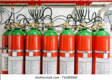 Hazard fire suppression system of a gas fire extinguishing. a closeup of the fire extinguishing system in an office building - Shutterstock ID 716383060