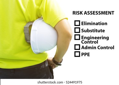 Hazard Identification And Risk Assessment Concept (Safety Work Place) - Engineering Man Or Safety Inspector Standing With Risk Assessment Checklist.