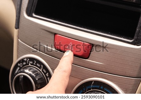 Hazard light button at the car 