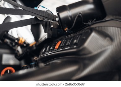 Hazard warning light button in the cockpit of a sports car
