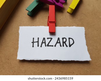 Hazard writting on table background.
