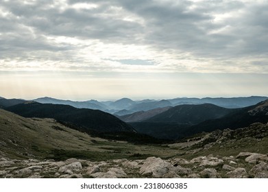 Haze Fills The Spaces Between The Peaks of Rocky Mountain National Park - Powered by Shutterstock