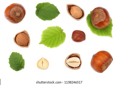 hazelnuts with leaves isolated on white background. top view - Shutterstock ID 1138246517
