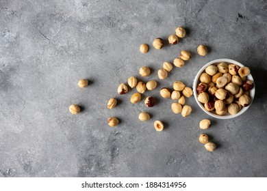 Hazelnuts on the rustic background. Background and textures. 