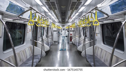 HazMat team in protective suits decontaminating metro car during virus outbreak. Coronavirus COVID-19 - Shutterstock ID 1675145755