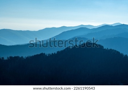 Hazy Mountain Layers Under A Blue Sky in Great Smoky Mountains National Park