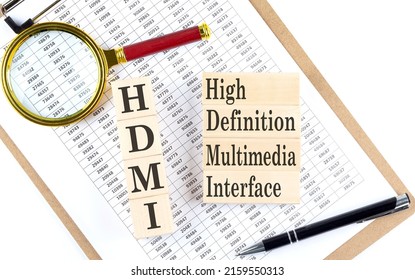 HDMI - High Definition Multimedia Interface text on wooden block on a chart background