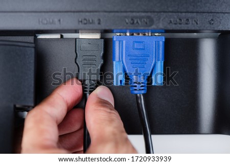 HDMI and VGA connector connected to the monitor.