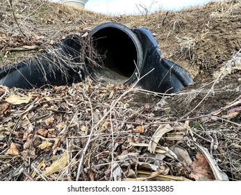 HDPE Drainage Culvert Under A Road Entrance. Pipe Is Used To Convey Stormwater Between Ditches.