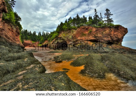 HDR (high dynamic range) image of caves and coastal features at low tide of the Bay of Fundy at St. Martins, New Brunswick, Canada.